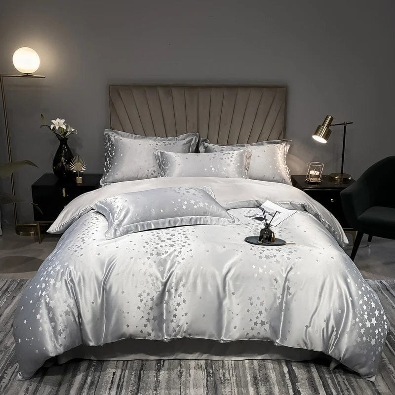 Luxury Jacquard bedding set with white embroidery duvet cover and matching pillowcases, showcasing high-end bed linens.