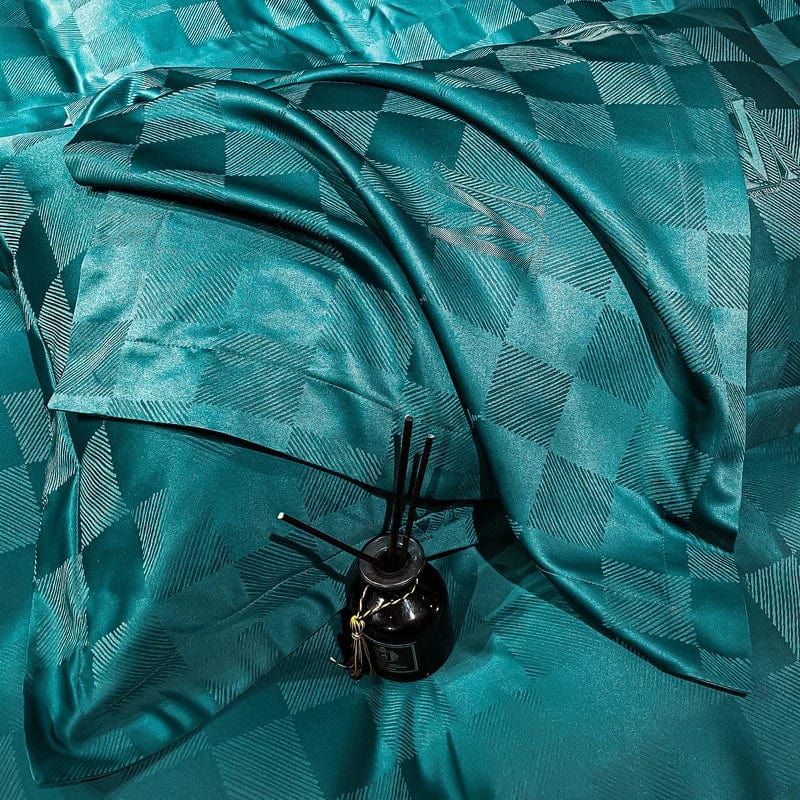 Luxury Jacquard Bedding Set with white embroidery, featuring duvet cover and pillowcases for a high-end, elegant bedroom look.