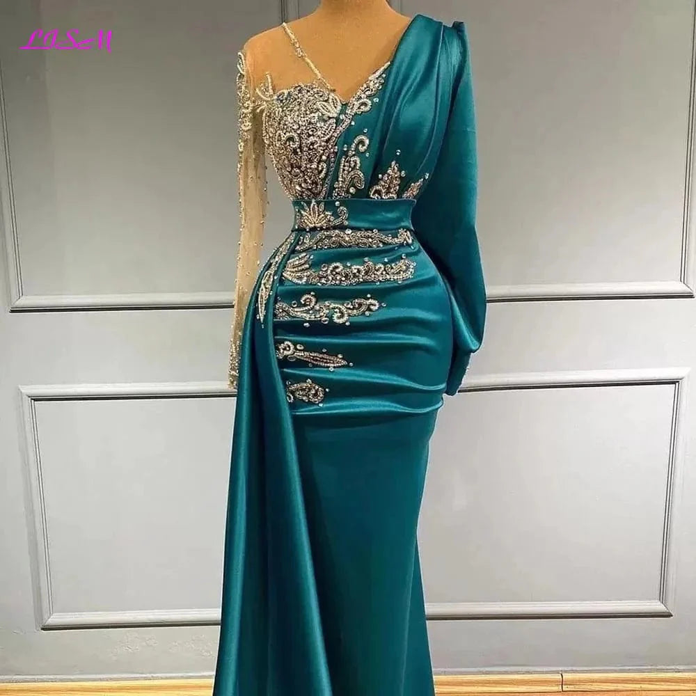 LISM Mermaid evening gown by SHOWLU FASHION STORE featuring long satin sleeves, sparkly crystals, and a sheer neckline.