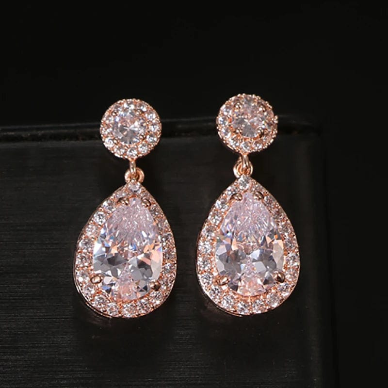 Showlu Fashion Young Cubic Zirconia Water Drop Dangle Earrings for bridal and wedding jewelry, featuring elegant long, round water drop design.