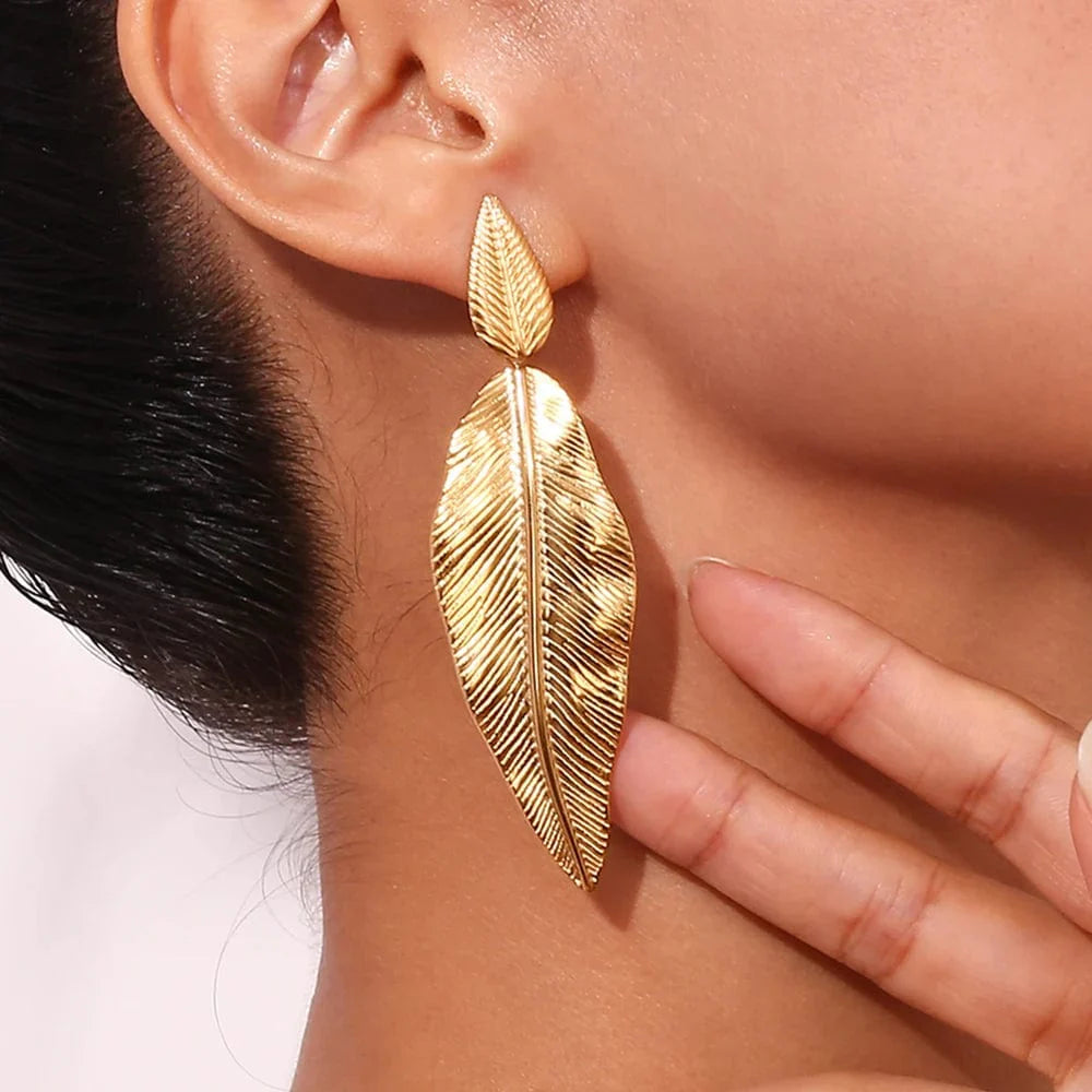 Elegant MamacitaSlay 18K gold plated stainless steel leaf drop earrings for women, featuring a sophisticated beach-inspired design.
