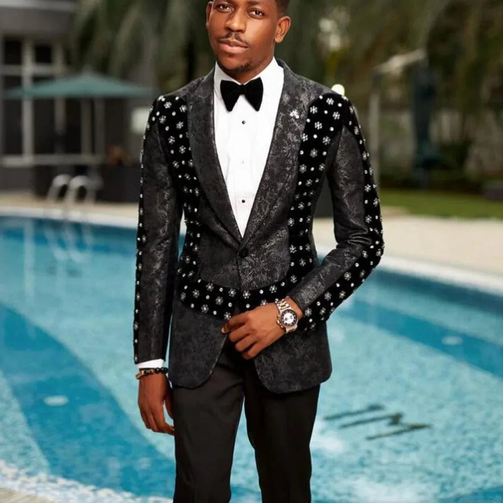 Slim fit velvet floral tuxedo for men, featuring a tailored jacket and matching pants, ideal for formal events and grooms.