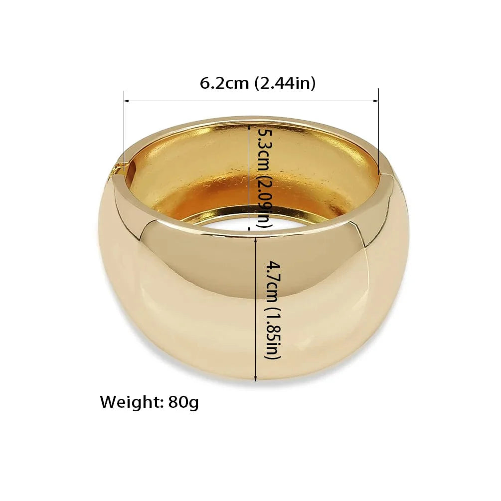 Wide gold alloy cuff bangle for women, shiny statement punk bracelet showcasing bold jewelry style and modern fashion design.