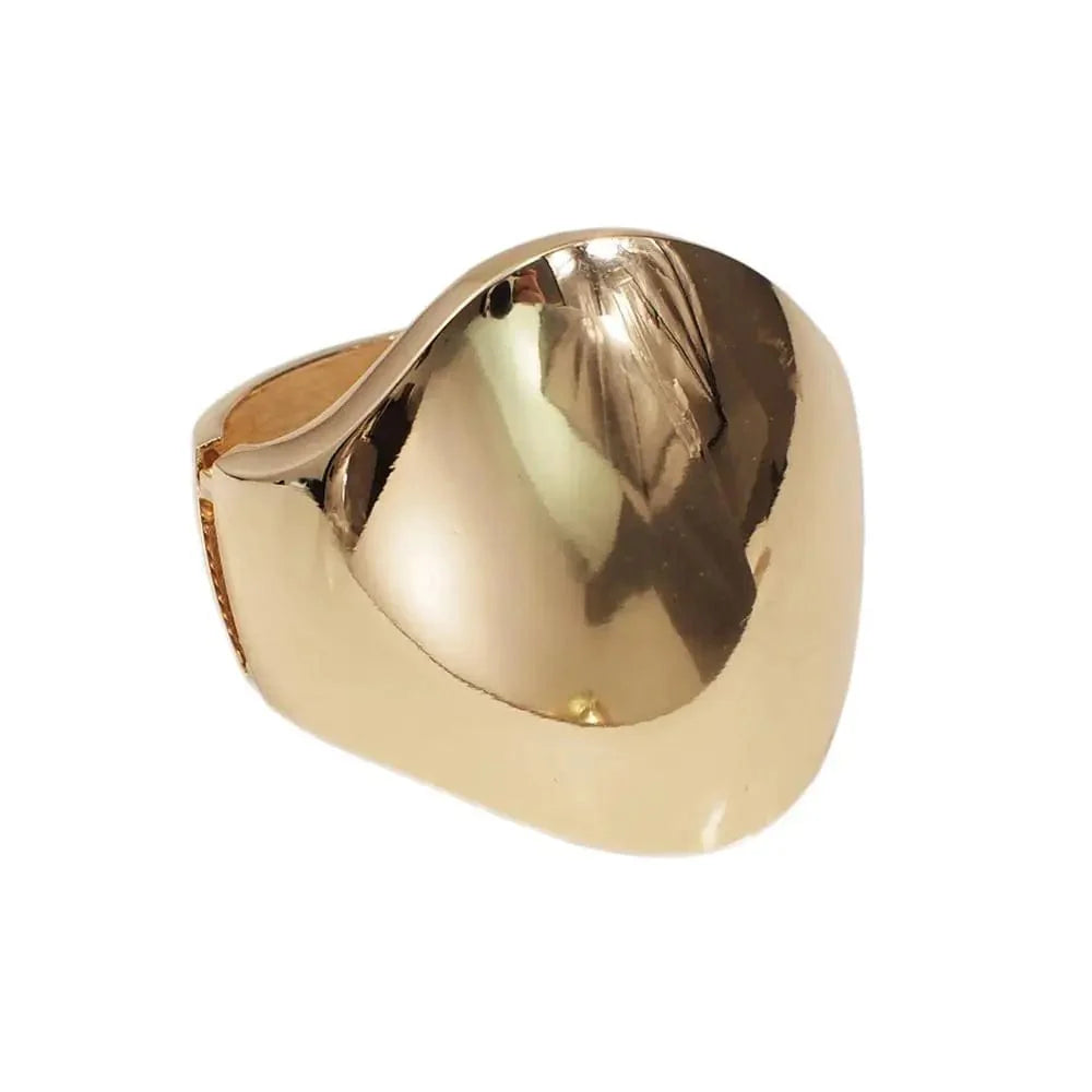 Shiny alloy cuff bangle with geometric design, statement bracelet for women, stylish punk-inspired jewelry by MANILAI.