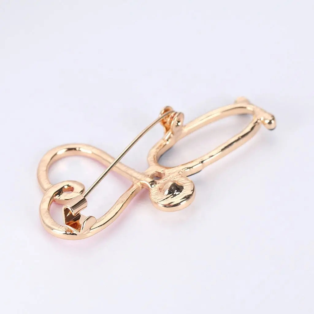 Showlu enamel nurse stethoscope brooch with rhinestones, perfect as a medical or doctor gift accessory.