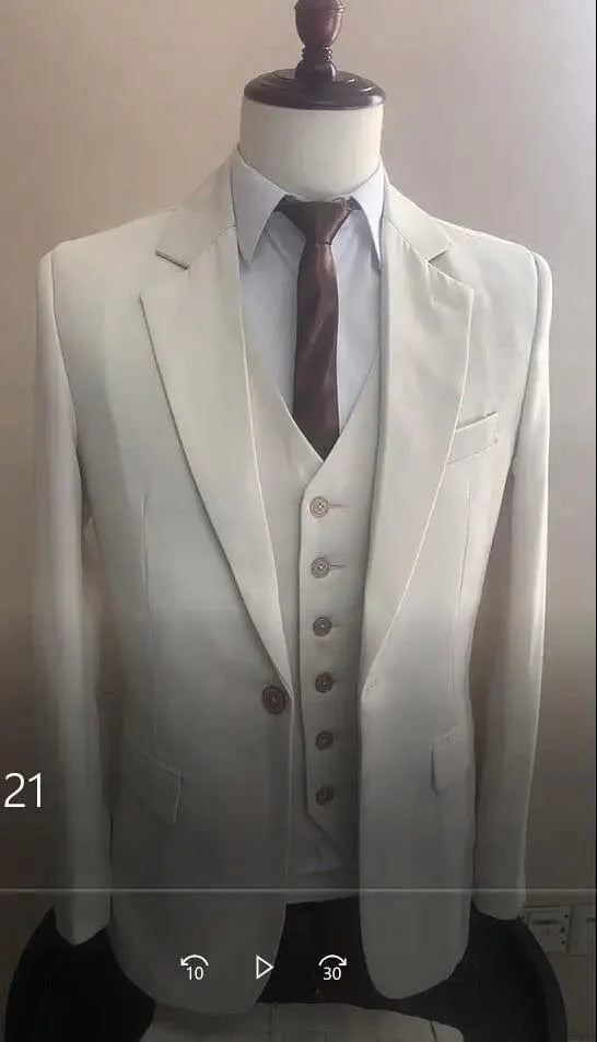 Men's slim fit 3-piece wedding tuxedo suit by SHOWLU FASHION STORE, featuring a wool blend fabric, jacket, vest, and pants for formal occasions.