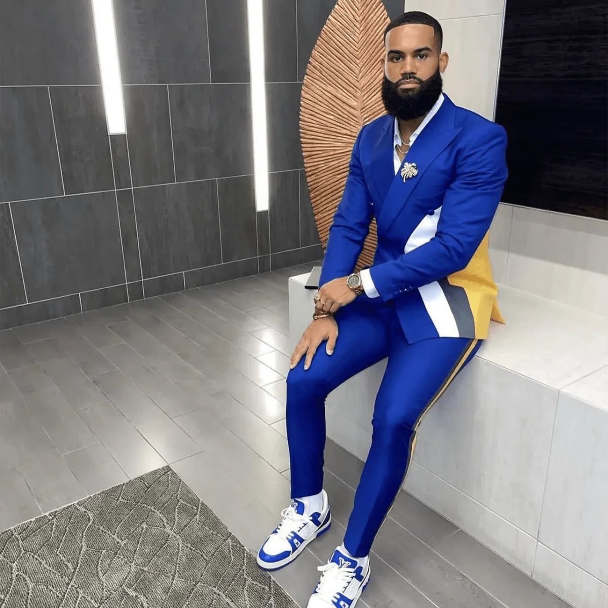Men's blue slim fit 2-piece suit with patchwork design, featuring blazer and trousers, ideal for wedding or formal occasions.