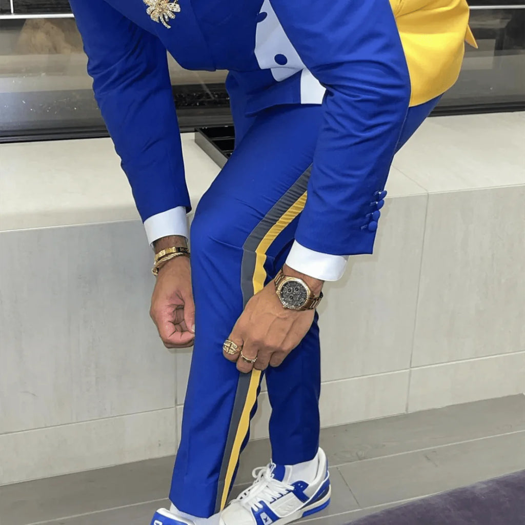 Slim fit blue patchwork men's suit by SHOWLU FASHION, featuring blazer and trousers for wedding or formal occasions.