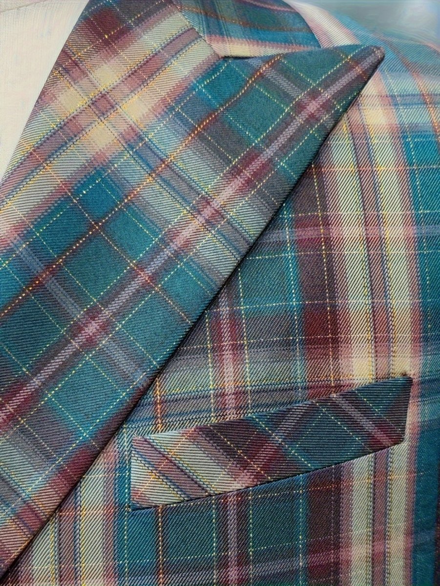 Men's plaid 2-piece suit by SHOWLU FASHION, regular fit, peak lapel, polyester fabric, with pocket details, suitable for casual or party wear.