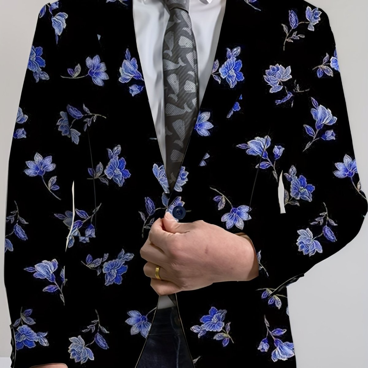 Men's navy blue floral print blazer with red, white, and blue flowers, two-button woven jacket, suitable for casual or formal wear.