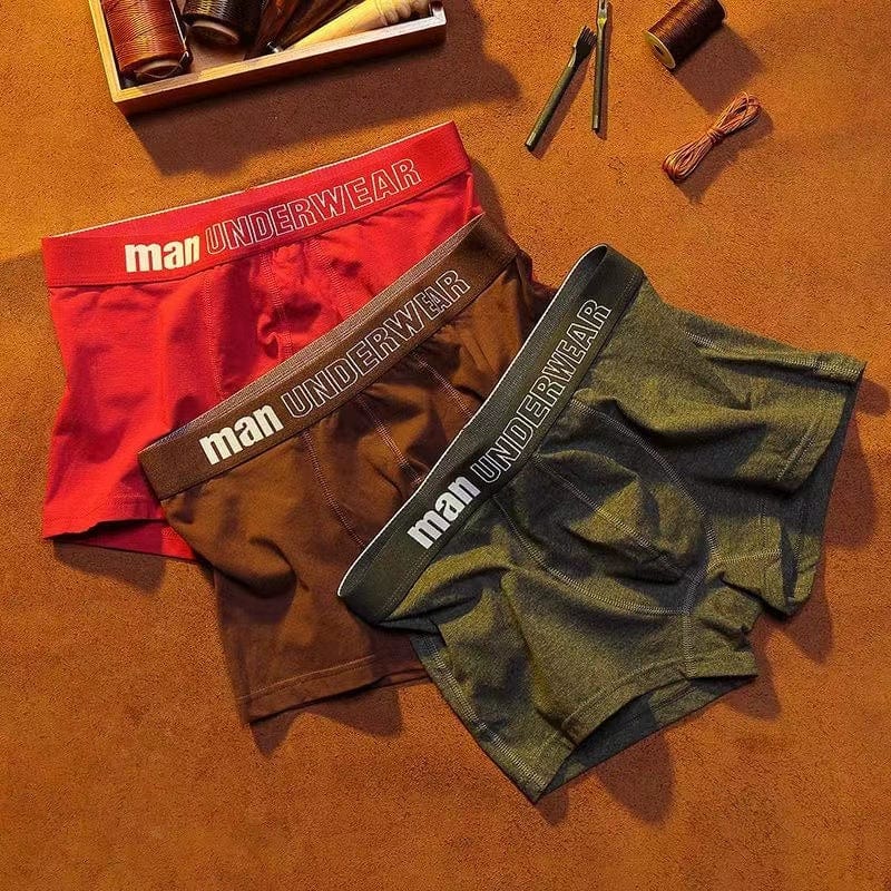 SHOWLU men's cotton antibacterial boxer briefs, mid-waist elastic underwear, large size, comfortable for teenagers in autumn.