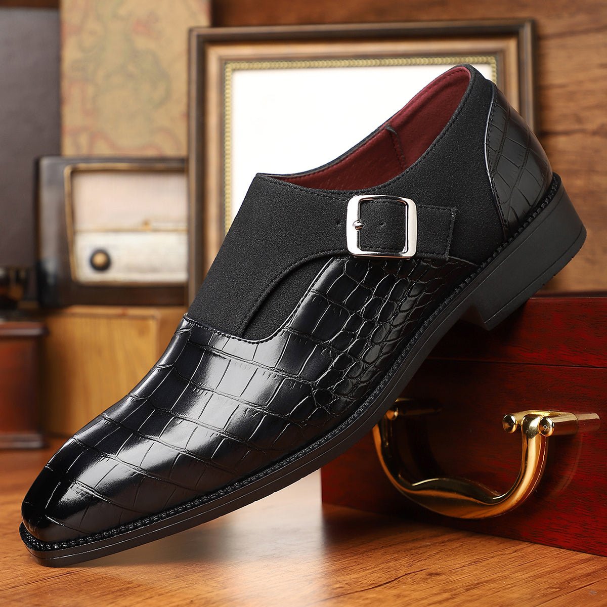 Men's navy blue monk strap shoes with pointed toe, crocodile pattern, adjustable buckle, slip-on design, suitable for formal or business wear.