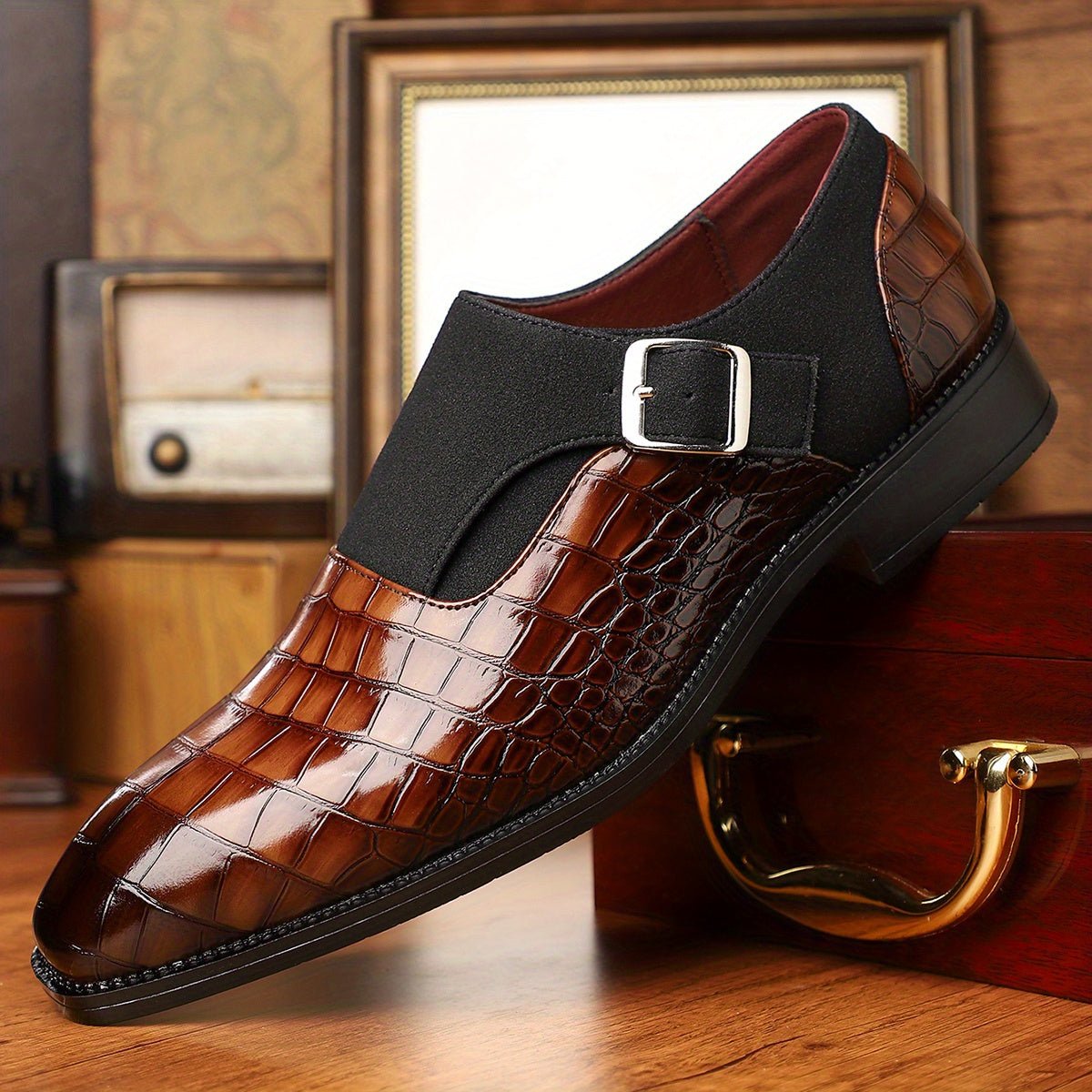 Men's navy blue monk strap shoes with crocodile pattern, pointed toe, and adjustable buckle for formal and business occasions.