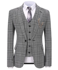 A grey plaid three-piece suit featuring a blazer, vest, and a matching patterned tie.