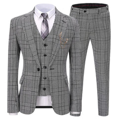 A grey plaid three-piece suit featuring a blazer, vest, and trousers with a white shirt and tie.