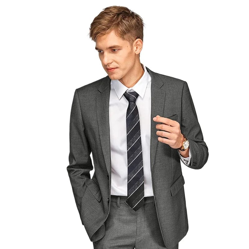 Men's slim fit 2-piece suit with single-breasted blazer and matching pants, in a solid color, suitable for business and formal occasions.