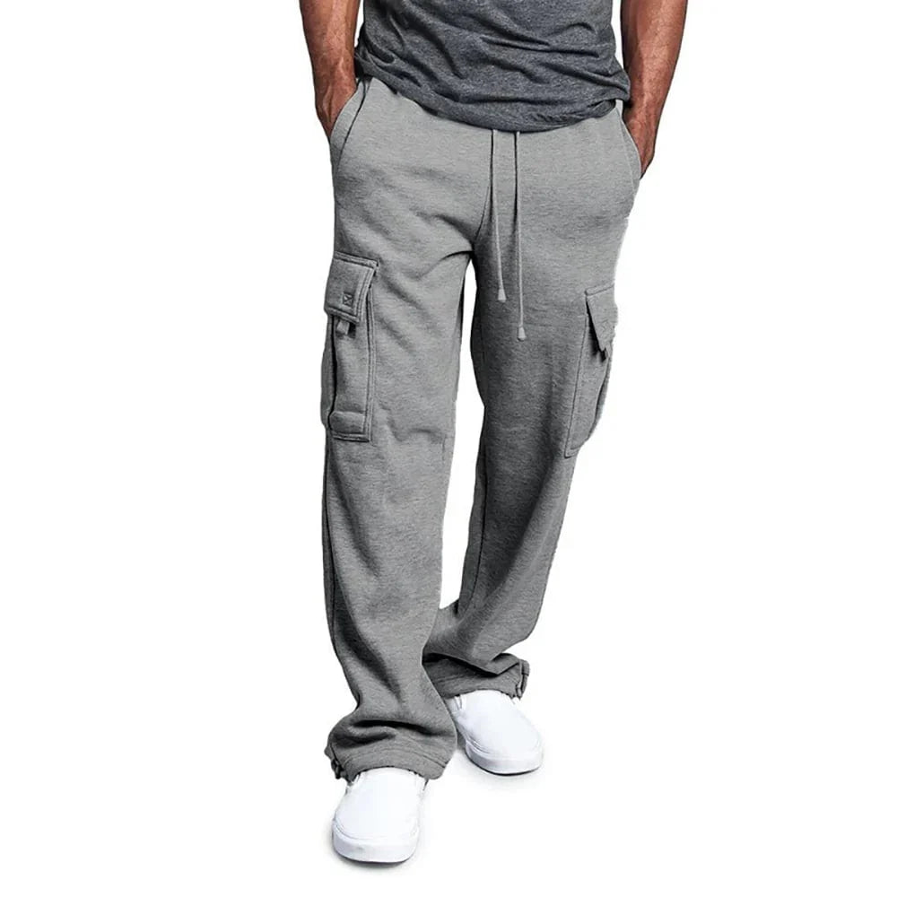 Men's Showlu Fashion straight fit joggers in midweight polyester with drawstring waist, multiple pockets, suitable for sports and streetwear.