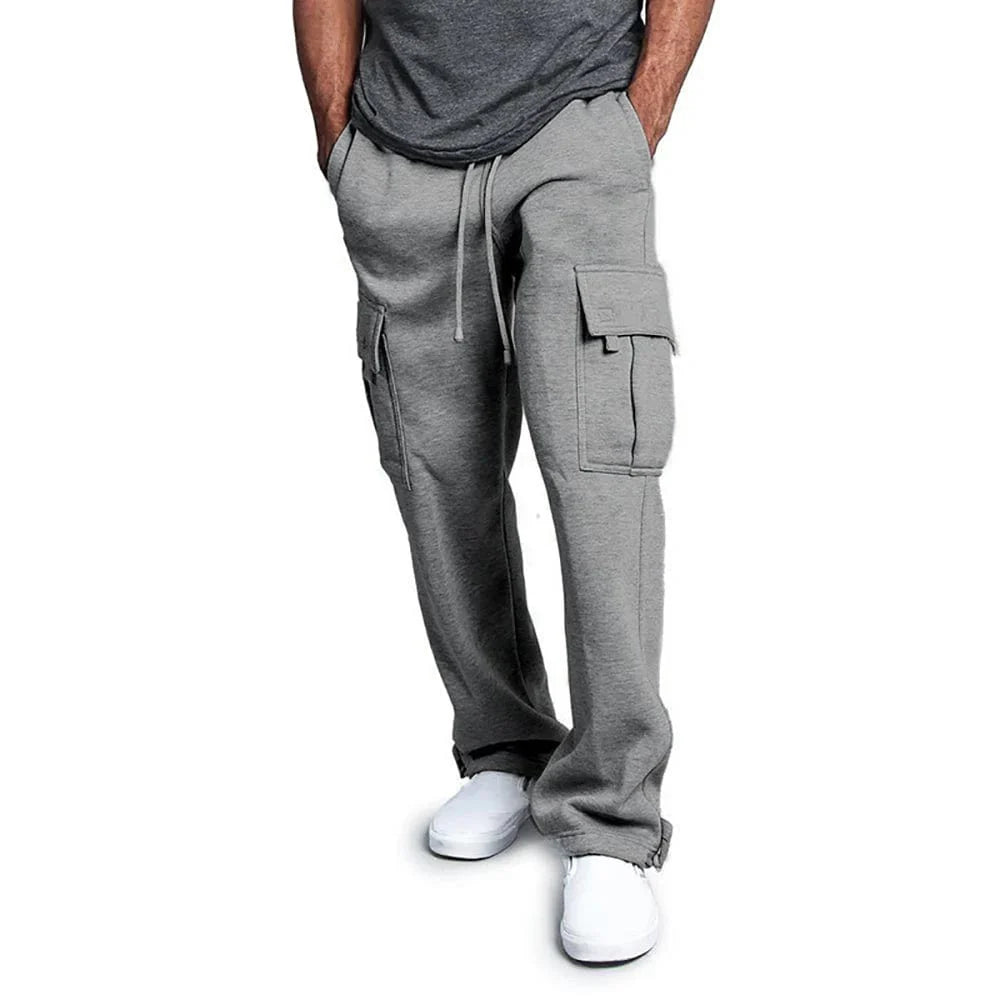 Men's Showlu Fashion straight fit joggers made of midweight polyester with drawstring waist, multiple pockets, suitable for sports and streetwear.