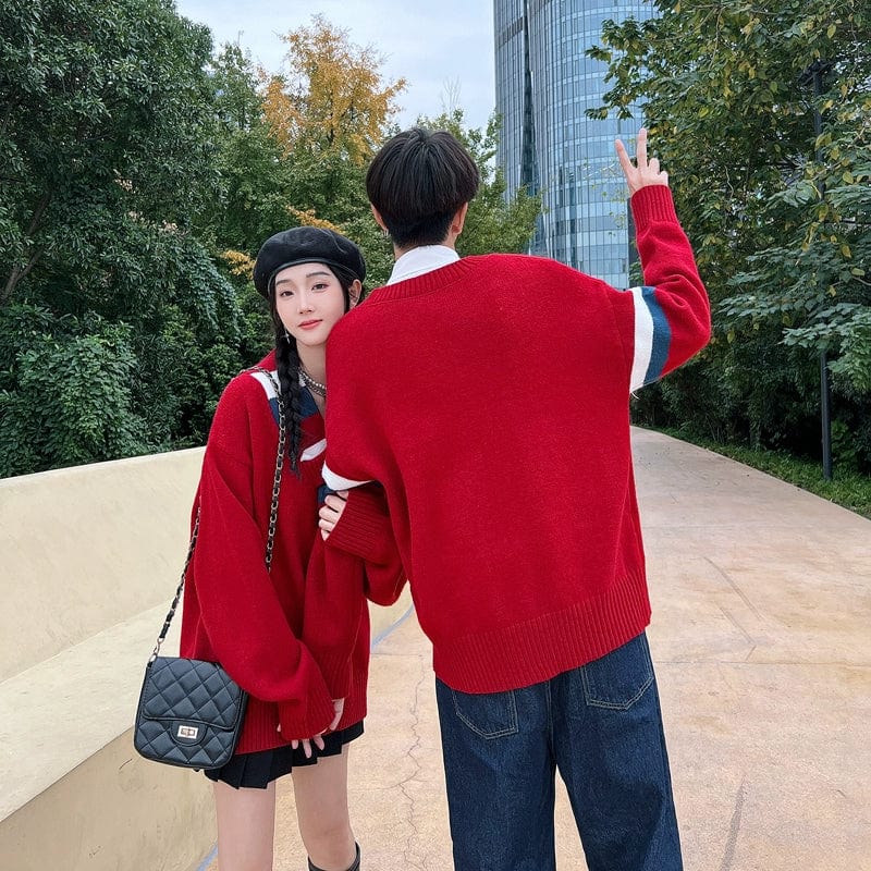 Young man and woman wearing Showlu Fashion men's V-neck Christmas pullovers, showcasing thick, warm long-sleeve holiday sweaters.