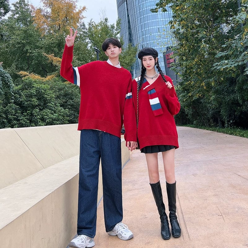 Young adult couple wearing Showlu Fashion men's V-neck Christmas pullovers, featuring thick warm long sleeves for holiday comfort.