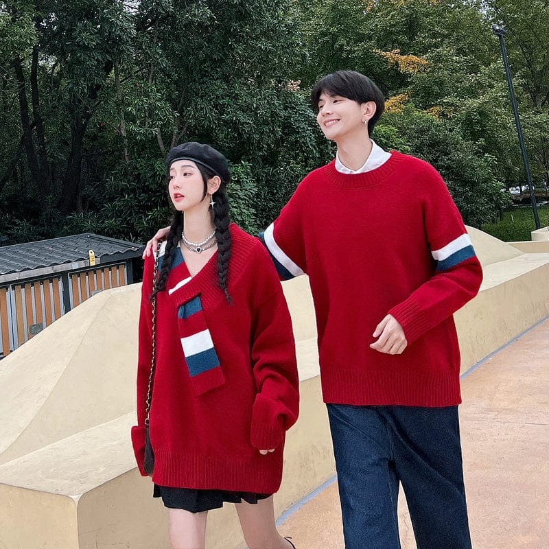 Young adult couple wearing Showlu Fashion men's V-neck Christmas pullovers, showcasing thick warm long sleeve sweaters for the holidays.