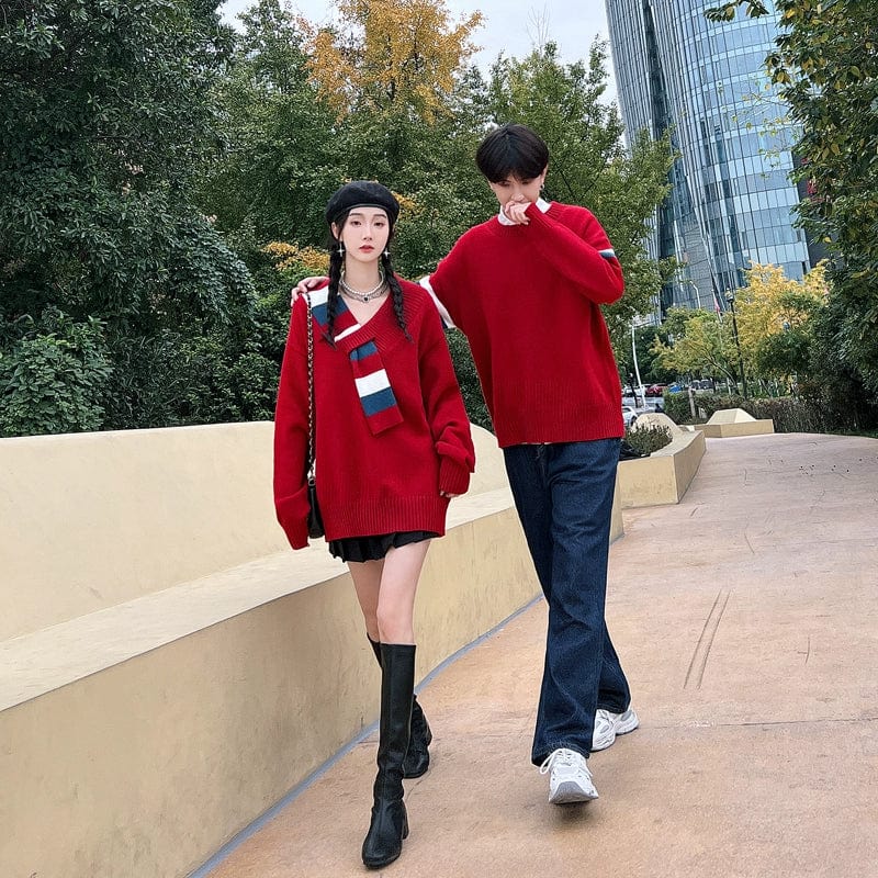 Young adult couple wearing Showlu Fashion men's V-neck Christmas pullovers, cozy and warm long-sleeve sweaters for the holiday season