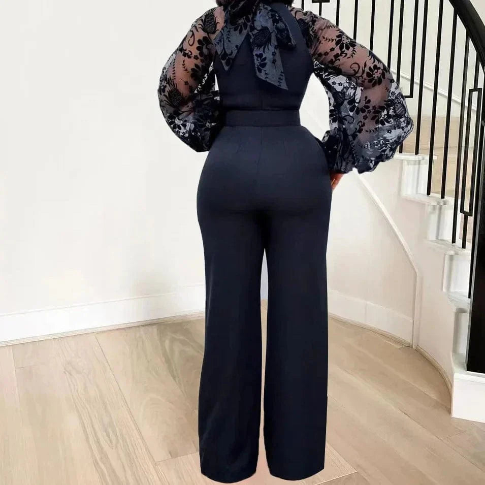 White mesh lace jumpsuit for women with long sleeves and wide-leg pants, featuring a stylish one-piece romper design.