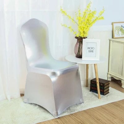 Shiny metallic gold and silver lycra spandex chair covers with luxurious finish, ideal for wedding or event decoration.