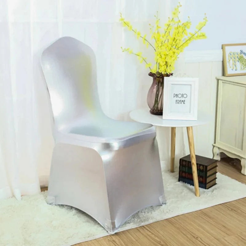 Metallic gold and silver spandex chair covers for weddings, shiny luxe fabric with elegant bronze color and luxurious design.