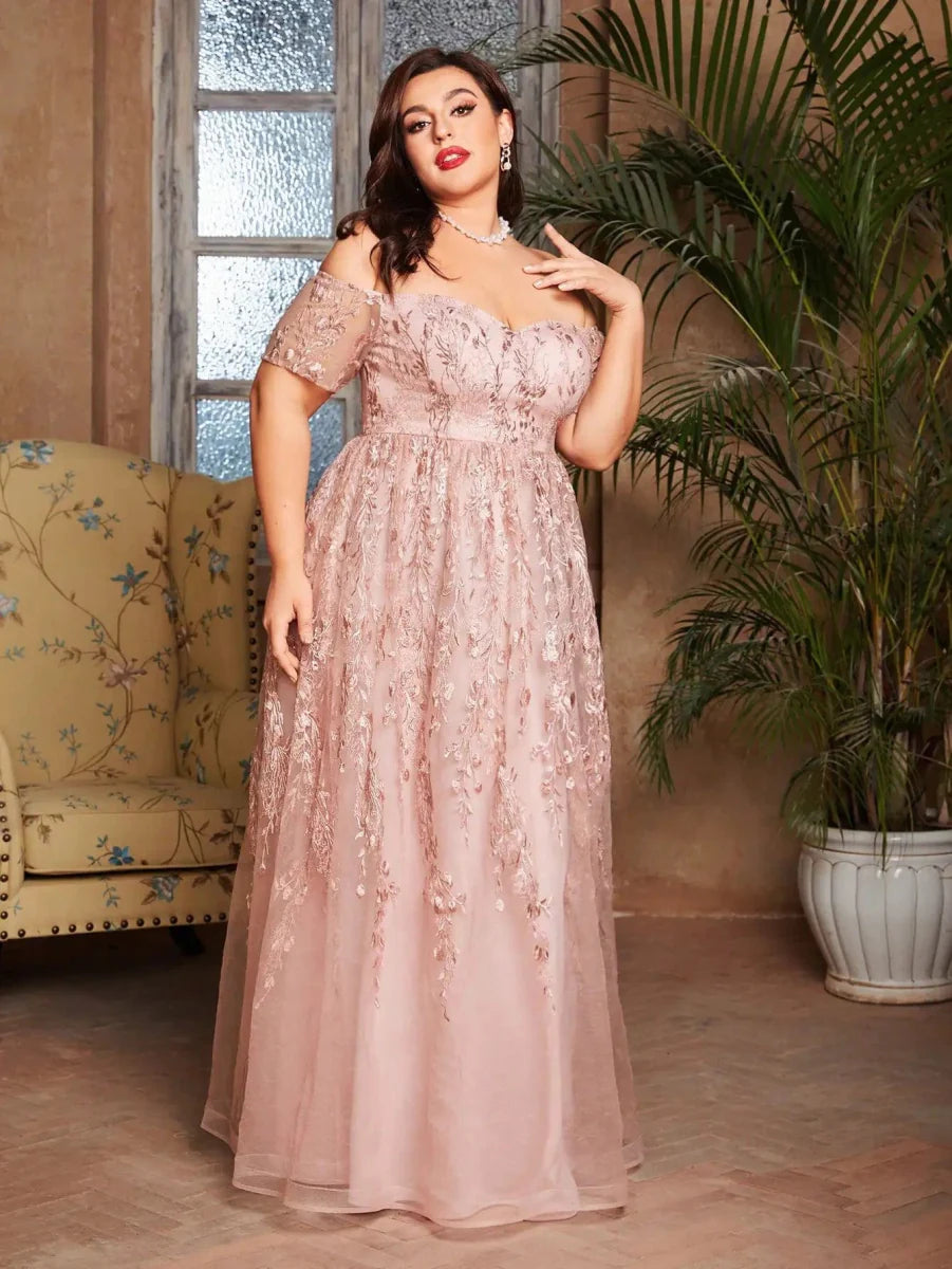 Plus size embroidered lace evening gown by SHOWLU FASHION with short sleeves and long romantic lace skirt, perfect for formal events.