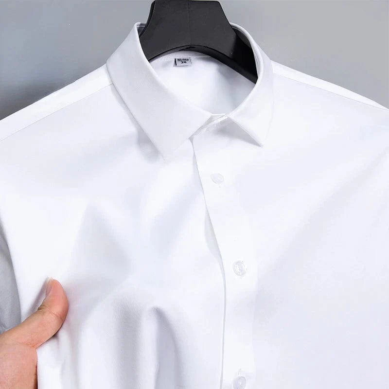 SHOWLU men's slim fit long sleeve work shirt in micro elastic broadcloth, featuring a casual yet professional design in white, black, or blue