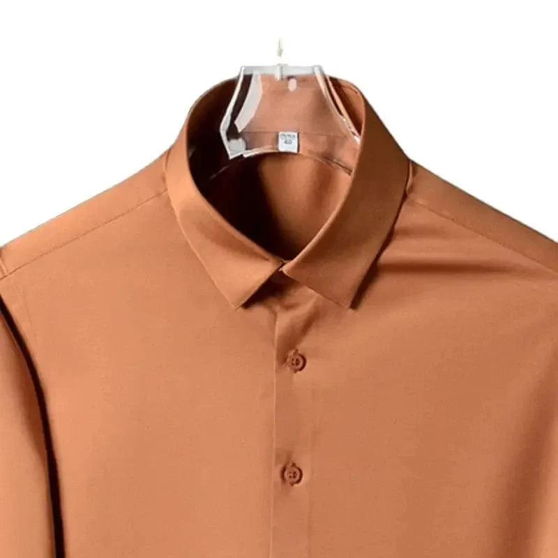 SHOWLU men's slim fit long sleeve work shirt in micro elastic broadcloth, available in white, black, and blue, casual and formal style.