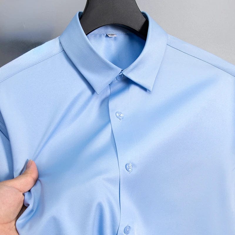 SHOWLU men's slim fit long sleeve work shirt in white, black, or blue made of micro elastic broadcloth, casual and formal wear for men.