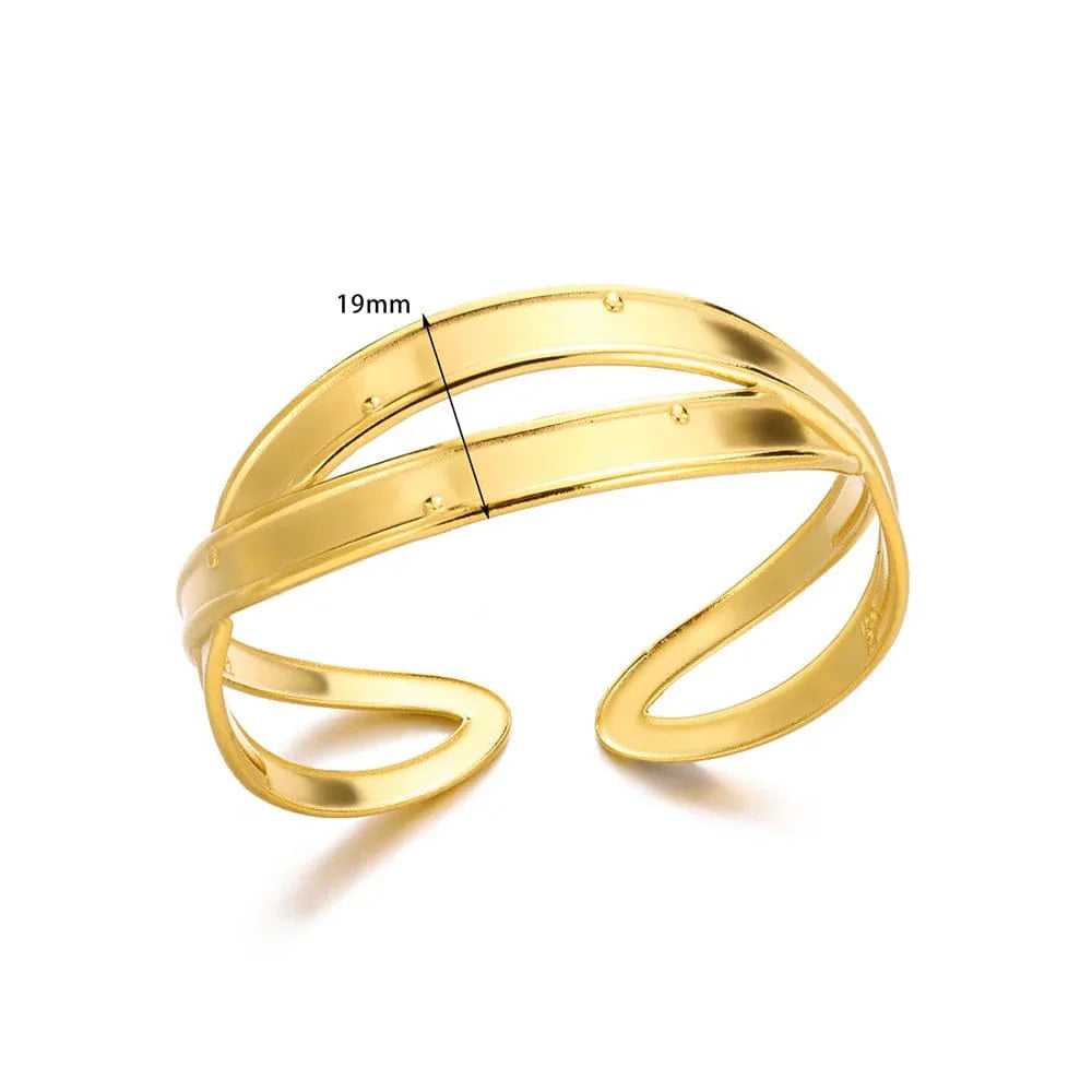 Minimalist stainless steel cuff bracelet in vintage gold, stylish bangle for women, everyday jewelry with textured charm.