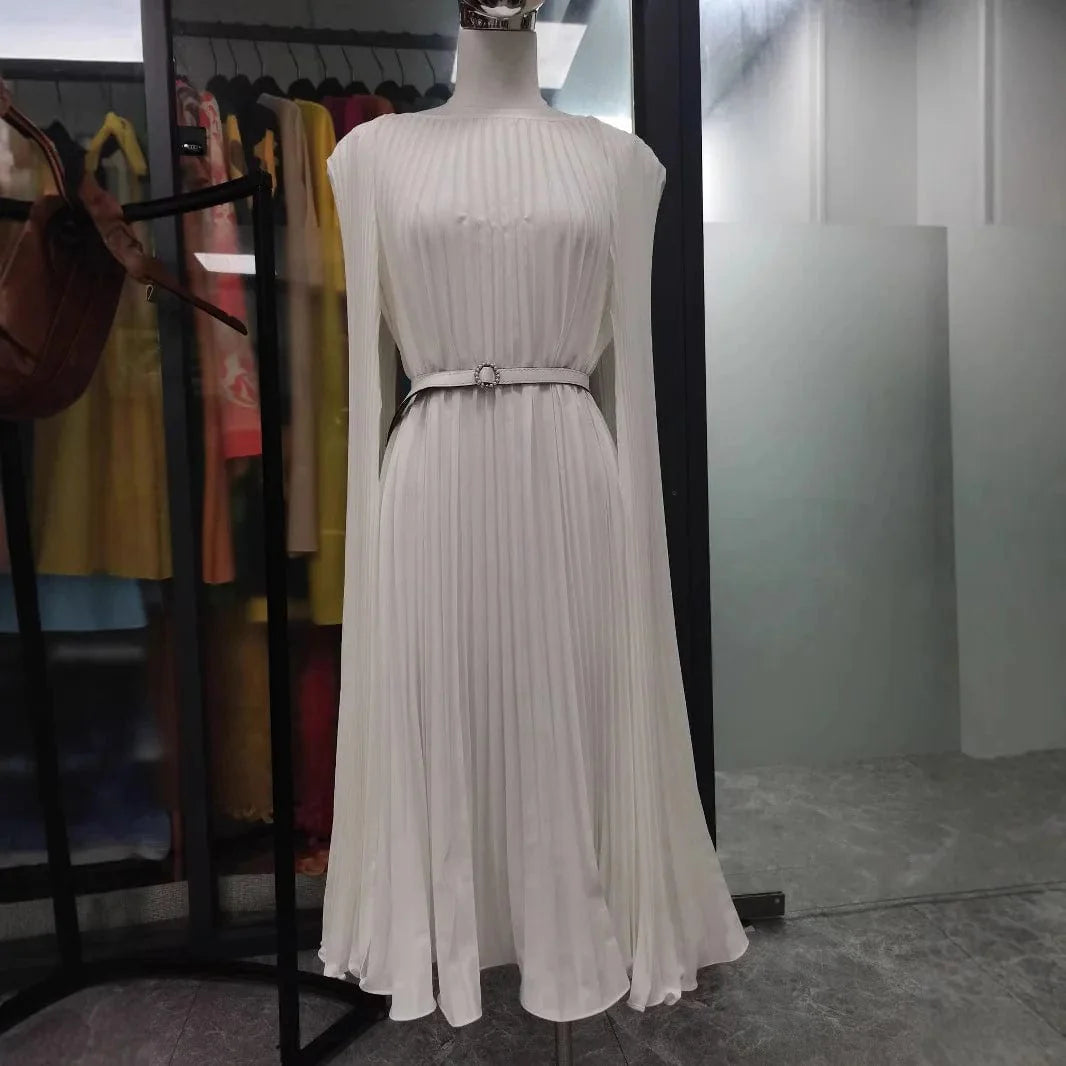 SHOWLU FASHION Miyake Fold A-Line Dress in solid color, loose fit, elegant design, perfect for autumn women's clothing.