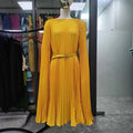 SHOWLU FASHION Miyake Fold A-Line Dress in solid color, loose fit, elegant design, perfect for autumn women's fashion.