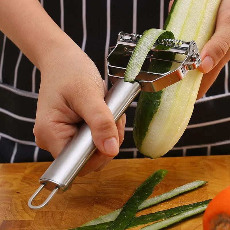 Stainless steel Kitchya vegetable peeler with ergonomic handle, featuring potato slicer and shredder for kitchen prep.