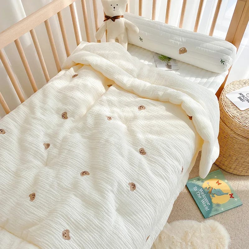 Showlu Muslin Baby Blanket featuring a cute bear and bunny design, 100% cotton swaddle wrap for newborns and infants.