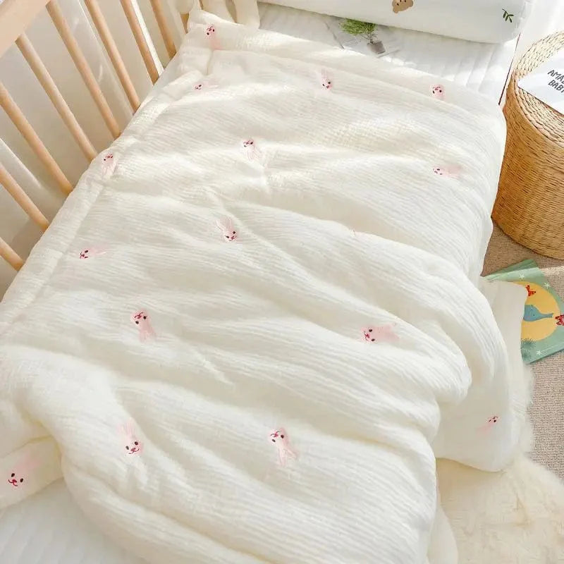Showlu Muslin Baby Blanket with bear and bunny design, 100% cotton swaddle wrap for newborns and infants.