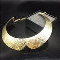 Gold wide choker necklace by Showlu Fashion, exaggerated nightclub collar style with bold, fashionable design for statement looks.