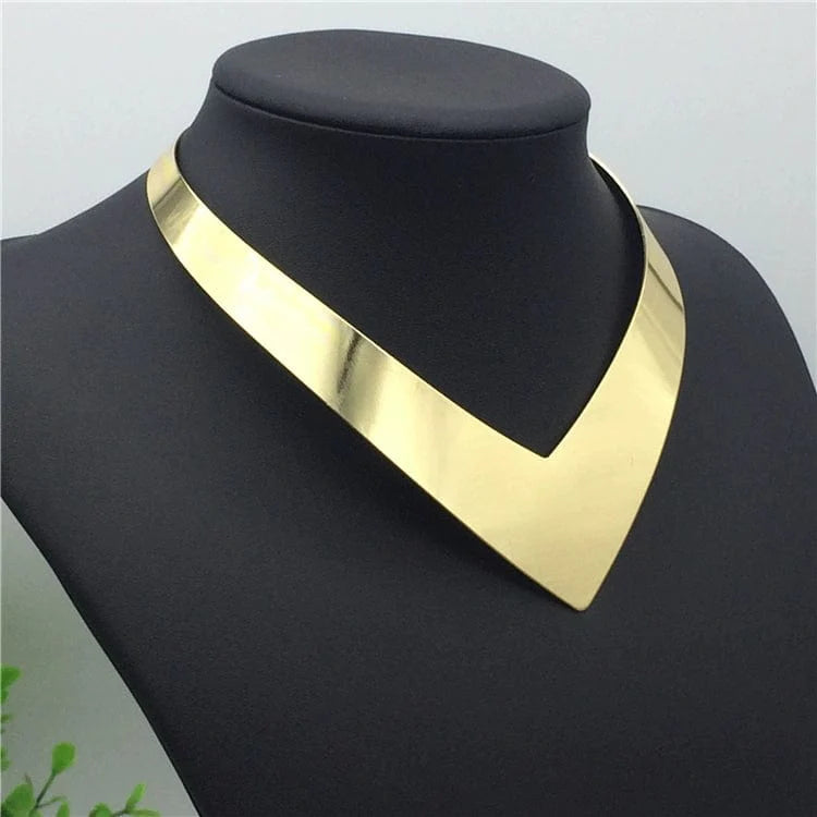 Gold wide choker necklace by Showlu Fashion, featuring an exaggerated, nightclub-style collar with bold, fashionable design.