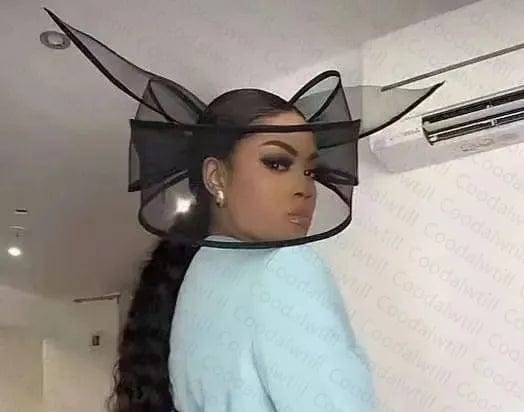 Elegant black pillbox hat by Showlu Fashion with a fascinator style, perfect for wedding or special occasion headwear.