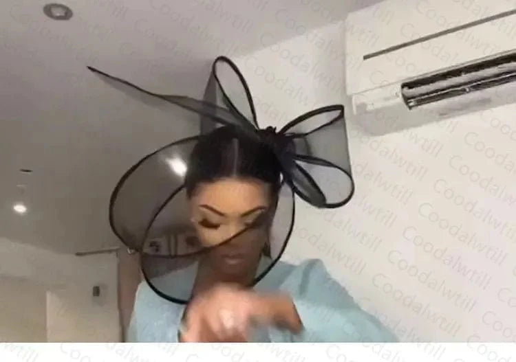 Showlu black pillbox hat with elegant fascinator design, featuring a hair clip for women’s wedding and formal occasions.