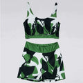 Camouflage print open-back two-piece bikini swimsuit by Showlu Fashion, featuring a sexy design with separate top and bottom.