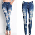 Liva Girl high waist ripped skinny jeans in black and white denim, showcasing slim fit elastic design for women.