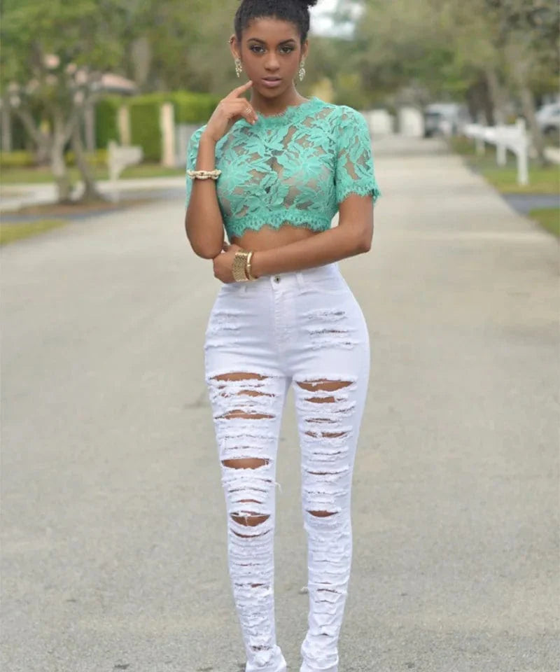 Liva Girl high waist ripped skinny jeans by Showlu Fashion Store, black and white elastic denim pants with distressed detailing.