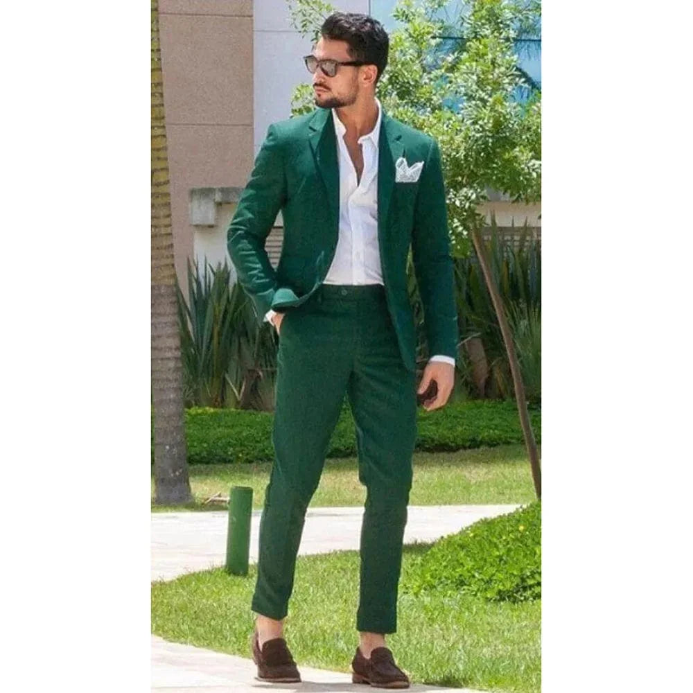 Green slim fit men's suit by SHOWLU FASHION, includes jacket and pants, tailored formal clothing for a sleek, stylish look.