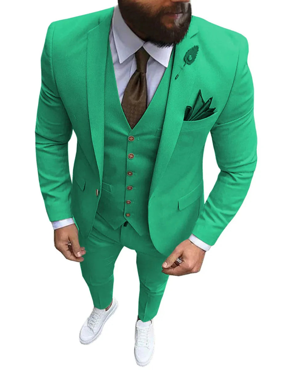 Pink men's 3-piece slim fit suit with notch lapel, tuxedo style, featuring blazer, vest, and pants for formal or wedding wear.