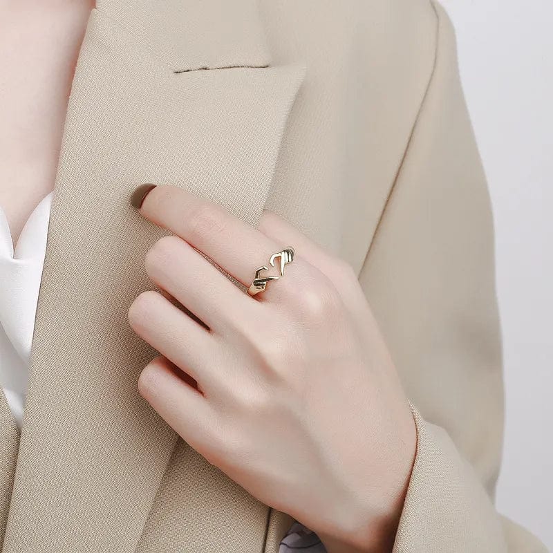 Silver adjustable heart-shaped hand ring for couples, romantic jewelry, creative open design, perfect for gifting or special occasions.