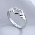 Silver adjustable heart-shaped hand ring for couples, romantic jewelry piece with creative design, perfect for gifts or special occasions.